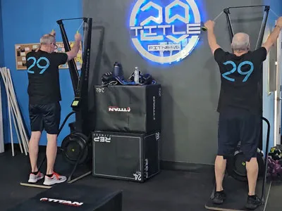 Member doing pull-ups at Title 29 Fitness in Fresno